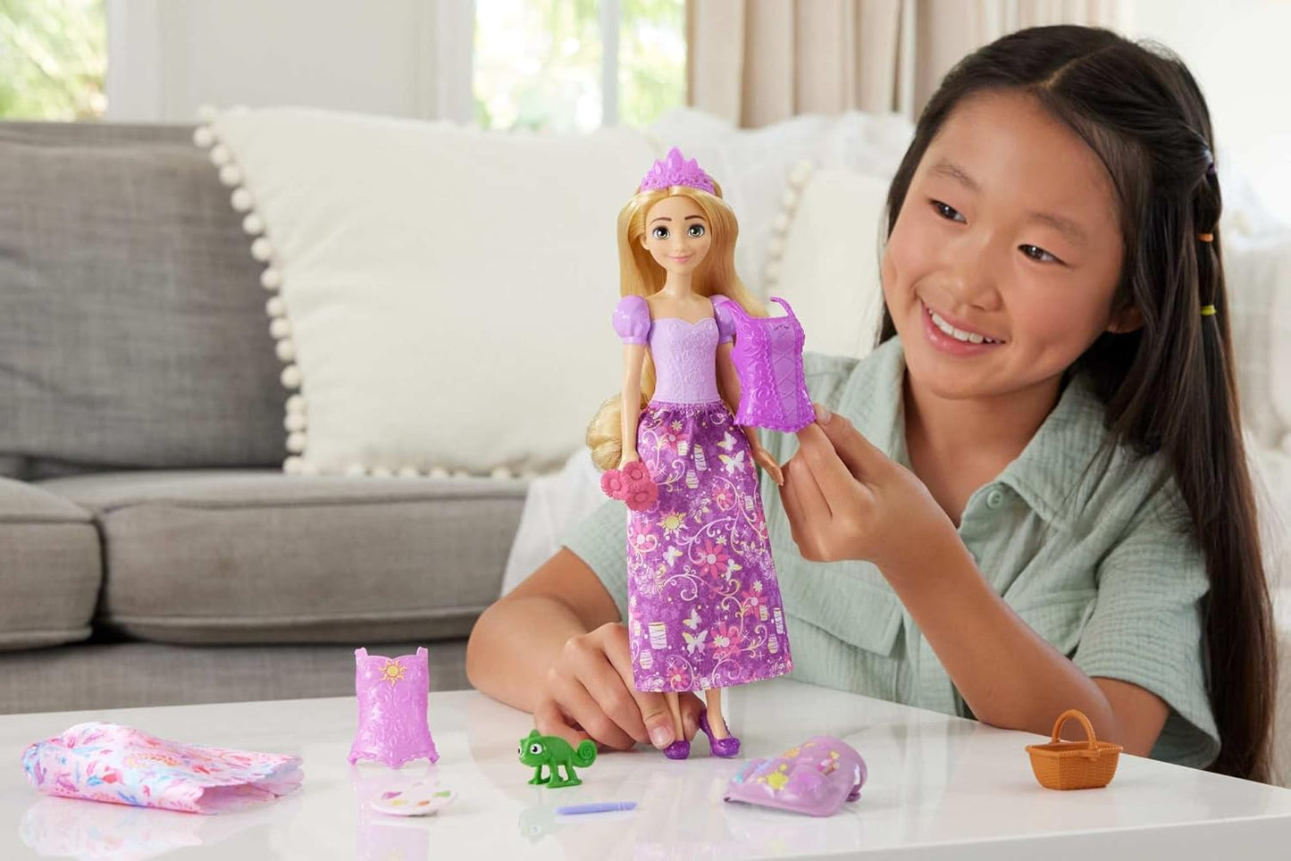 Disney Princess 2-in-1 Stories Rapunzel Fashion Doll with 2 Snap-On Bodices, 2 Skirts & 9 Accessories