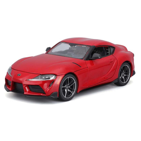 Maisto 1:24 scale Toyota GR Supra red diecast model car with opening doors and detailed interior.