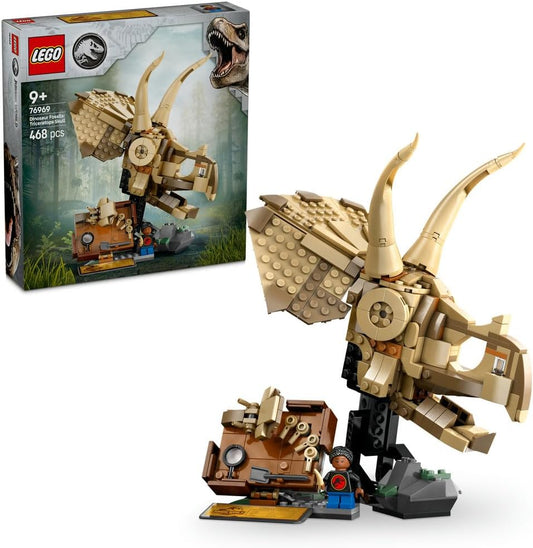 LEGO Jurassic World Triceratops Skull 76969 set featuring a detailed skull with movable jaw, display stand, dig site with tools, Junior Paleontologist minifigure, and information plaque, designed for builders aged 9+
