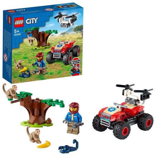 LEGO City Wildlife Rescue ATV 60300 set featuring a steerable ATV, drone, explorer minifigure, two monkeys, and a scorpion in a savanna scene.