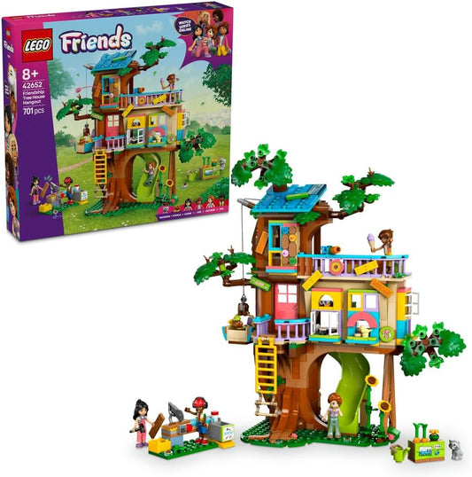 LEGO Friends Friendship Tree House Hangout 42652 showcasing a detailed tree house with customizable elements, a vegetable garden, and minifigures of Liann, Autumn, Leo, Zac, along with a dog and raccoon figure, designed for builders aged 8+