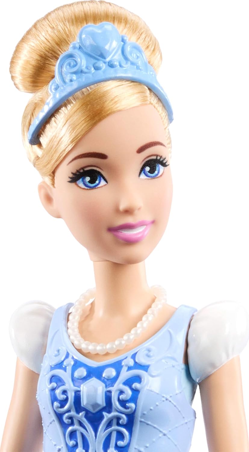 Disney Princess 2-in-1 Stories Cinderella Fashion Doll with 2 Snap-On Bodices, 2 Skirts & 9 Accessories