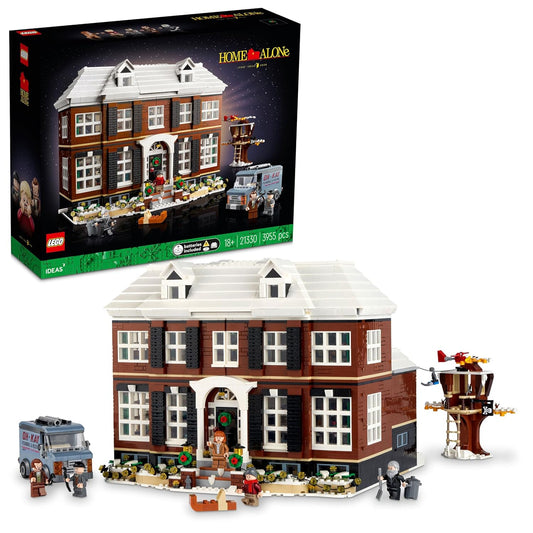 LEGO Ideas Home Alone 21330 set showcasing McCallister's House, treehouse, crooks' van, and minifigures of Kevin, Kate, Harry, Marv, and 'Old Man' Marley