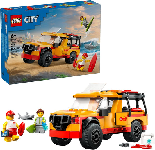 LEGO City Lifeguard Beach Rescue Truck 60453, showcasing a rugged off-road lifeguard vehicle with opening doors, sunroof, and tailgate, accompanied by lifeguard and surfer minifigures, plus a shark figure, designed for builders aged 6+.