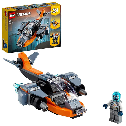 LEGO Creator Cyber Drone 31111 set with 113 pieces, featuring a drone, posable mech, and scooter models, accompanied by a robot minifigure with a transparent blue head