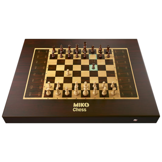 Miko Chess Grand – AI-powered electronic chess board with magnetic wooden design and automated self-moving chess pieces.

