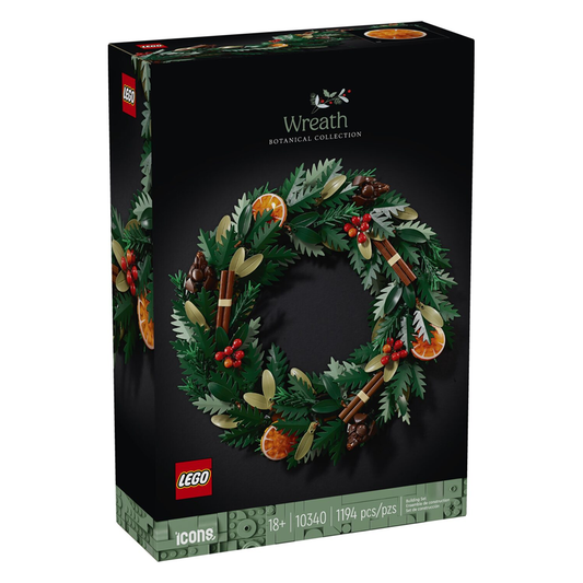 LEGO Icons 10340 Wreath featuring fir branches, berries, orange slices, cinnamon sticks, and pinecones, suitable for wall or table decoration.​